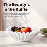 10 inches hand-carved scalloped marble bowl filled with fresh fruit