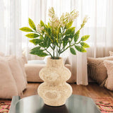 6 inches Travertine marble flower vase centered on a coffee table.