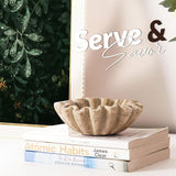 6 inches Travertine ruffle bowl styled on stacked books for home decor and coffee table display