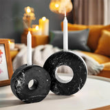 Black marble candle holders used as living room table decor