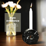 Black Marble candlestick holders decorating a dinner table setup