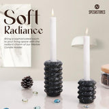 Black marble candle holders with taper candles styled for home decor, showing soft radiance and modern design by Speshstones