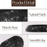 Close-up of marble oval tray in black showing smooth edges, solid stone surface, and fine craftsmanship