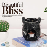 Black Marble Wax warmer used as Easter and Christmas home decor centerpiece