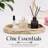 Green marble oval tray used for organizing perfume, makeup, and daily essentials on bathroom countertop
