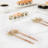 Green onyx marble chopstick rests in formal dinner party place setting — natural stone chopstick holder and knife rest for entertaining and hosting by Speshstones
