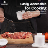 Hand using white marble salt cellar for seasoning meat – ideal for cooking and easy access to salt