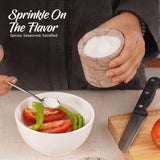 marinara marble salt cellar used for seasoning on kitchen countertop