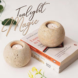 Close-up of medium travertine tea light candle holder showing natural stone texture