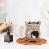 Oceanic marble oil burner used as a decorative centerpiece on a living room table