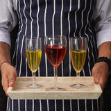 Rectangular travertine serving tray used to carry drinks outdoors