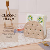 travertine marble napkin holder placed on dining table with paper napkins