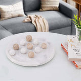 Travertine Marble Tic Tac Toe set styled as a decorative piece on a modern coffee table with books – Speshstones home decor accent