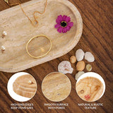 Close-up of travertine oval tray showing smooth edges, solid stone surface, and fine craftsmanship
