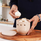 Garlic stored in open Verona marble garlic container with lid off