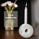 White Marble candlestick holders decorating a dinner table setup