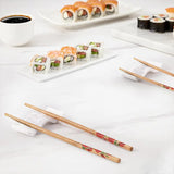 White marble chopstick rests in formal dinner party place setting — natural stone chopstick holder and knife rest for entertaining and hosting by Speshstones