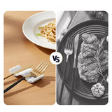 White marble chopstick rests used as knife rest and fork rest on wooden dining table beside pasta dish — marble knife rest keeps cutlery off table surface compared to cutlery resting directly on plate — natural stone dining accessory by Speshstones